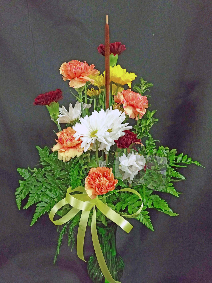 EA 1262 Orange splash with daisies Flowers N' More